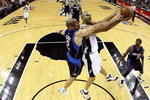 SAN ANTONIO - APRIL 28:  Guard Tony Parker #9 of the San Antonio Spurs takes a shot against Jason Kidd #2 of the Dallas Mavericks in Game Five of the Western Conference Quarterfinals during the 2009 NBA Playoffs at AT&T Center on April 28, 2009 in San Antonio, Texas. NOTE TO USER: User expressly acknowledges and agrees that, by downloading and or using this photograph, User is consenting to the terms and conditions of the Getty Images License Agreement.  (Photo by Ronald Martinez/Getty Images)