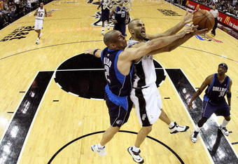 SAN ANTONIO - APRIL 28:  Guard Tony Parker #9 of the San Antonio Spurs takes a shot against Jason Kidd #2 of the Dallas Mavericks in Game Five of the Western Conference Quarterfinals during the 2009 NBA Playoffs at AT&T Center on April 28, 2009 in San Antonio, Texas. NOTE TO USER: User expressly acknowledges and agrees that, by downloading and or using this photograph, User is consenting to the terms and conditions of the Getty Images License Agreement.  (Photo by Ronald Martinez/Getty Images)