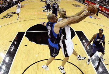 SAN ANTONIO - APRIL 28:  Guard Tony Parker #9 of the San Antonio Spurs takes a shot against Jason Kidd #2 of the Dallas Mavericks in Game Five of the Western Conference Quarterfinals during the 2009 NBA Playoffs at AT&T Center on April 28, 2009 in San Antonio, Texas. NOTE TO USER: User expressly acknowledges and agrees that, by downloading and or using this photograph, User is consenting to the terms and conditions of the Getty Images License Agreement.  (Photo by Ronald Martinez/Getty Images)