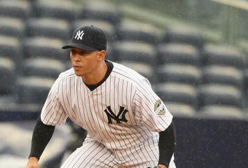 NEW YORK - APRIL 22:  Cody Ransom #12 of The New York Yankees in action against The Oakland Athletics during their game on April 22, 2009 at Yankee Stadium in the Bronx Borough of New York.  (Photo by Al Bello/Getty Images)