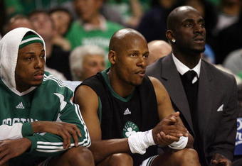 BOSTON - APRIL 18:  Paul Pierce #34, Ray Allen #20 and Kevin Garnett #5 of the Boston Celtics watch from the bench in the first half against the Chicago Bulls  in Game One of the Eastern Conference Quarterfinals during the 2009 NBA Playoffs at TD Banknorth Garden on April 18, 2009 in Boston, Massachusetts. NOTE TO USER: User expressly acknowledges and agrees that, by downloading and or using this photograph, User is consenting to the terms and conditions of the Getty Images License Agreement. (Photo by Elsa/Getty Images)