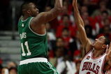 CHICAGO - APRIL 30: Glen Davis #11 of the Boston Celtics puts up a shot over Derrick Rose #1 of the Chicago Bulls in Game Six of the Eastern Conference Quarterfinals during the 2009 NBA Playoffs at the United Center on April 30, 2009 in Chicago, Illinois. The Bulls defeated the Celtics 128-127 in triple-overtime. NOTE TO USER: User expressly acknowledges and agreees that, by downloading and/or using this Photograph, User is consenting to the terms and conditions of the Getty Images License Agreement. (Photo by Jonathan Daniel/Getty Images)