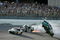 TALLADEGA, AL - APRIL 26:  Carl Edwards, driver of the #99 Claritin Ford, goes airborne as Ryan Newman, driver of the #39 Steweart-Haas Racing Chevrolet suffers damage and Brad Keselowski, driver of the #09 Miccosukee Indian Gaming Chevrolet drives at the conclusion of the NASCAR Sprint Cup Series Aaron's 499 at Talladega Superspeedway on April 26, 2009 in Talladega, Alabama.  (Photo by Jerry Markland/Getty Images for NASCAR)