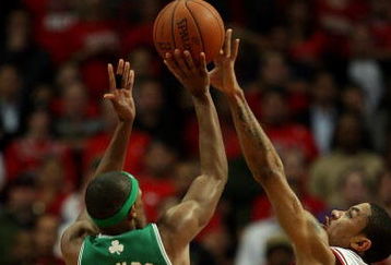 CHICAGO - APRIL 30: Derrick Rose #1 of the Chicago Bulls blocks a shot in the closing seconds of the third overtime period by Rajon Rondo #9 of the Boston Celtics in Game Six of the Eastern Conference Quarterfinals during the 2009 NBA Playoffs at the United Center on April 30, 2009 in Chicago, Illinois. The Bulls defeated the Celtics 128-127 in triple-overtime. NOTE TO USER: User expressly acknowledges and agreees that, by downloading and/or using this Photograph, User is consenting to the terms and conditions of the Getty Images License Agreement. (Photo by Jonathan Daniel/Getty Images)