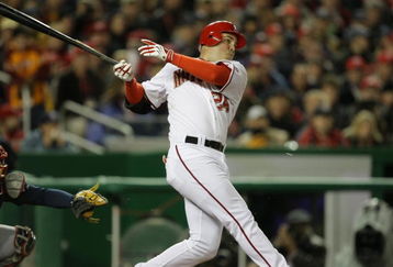 WASHINGTON, DC - MARCH 30: Nick Johnson #24  of the Washington Nationals hits a RBI double in the first inning during the game against the Atlanta Braves on opening day March 30, 2008 at Nationals Park in Washington, D.C. (Photo by Drew Hallowell/Getty Images) 