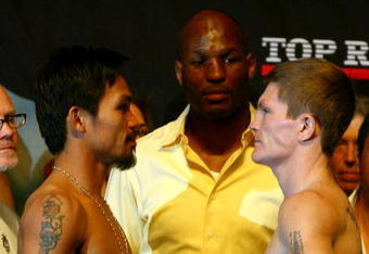 LAS VEGAS - MAY 01:  (L-R) Manny Pacquiao of the Philippines and Ricky Hatton of England pose after both fighters stepped on the scale during the weigh-in for their junior welterweight title fight at the MGM Grand Garden Arena May 1, 2009 in Las Vegas, Nevada.Photo by Al Bello/Getty Images)  (Photo by Al Bello/Getty Images)