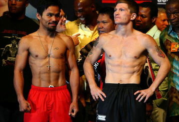 LAS VEGAS - MAY 01:  (L-R) Manny Pacquiao of the Philippines and Ricky Hatton of England pose after both fighters stepped on the scale during the weigh-in for their junior welterweight title fight at the MGM Grand Garden Arena May 1, 2009 in Las Vegas, Nevada.Photo by Al Bello/Getty Images)  (Photo by Al Bello/Getty Images)