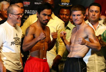 LAS VEGAS - MAY 01:  Manny Pacquiao of the Philippines and Ricky Hatton of England pose after both fighters stepped on the scale during the weigh-in for their junior welterweight title fight at the MGM Grand Garden Arena May 1, 2009 in Las Vegas, Nevada.Photo by Al Bello/Getty Images)