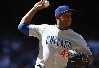 PHOENIX - APRIL 29:  Relief pitcher Carlos Marmol #49 of the Chicago Cubs attempts a pick off against the Arizona Diamondbacks during the game at Chase Field on April 29, 2009 in Phoenix, Arizona. The Diamondbacks defeated the Cubs 10-0.  (Photo by Christian Petersen/Getty Images)