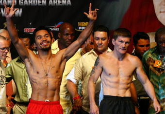 LAS VEGAS - MAY 01:  (L-R) Manny Pacquiao of the Philippines and Ricky Hatton of England pose after both fighters stepped on the scale during the weigh-in for their junior welterweight title fight at the MGM Grand Garden Arena May 1, 2009 in Las Vegas, Nevada.Photo by Al Bello/Getty Images)  (Photo by Al Bello/Getty Images)
