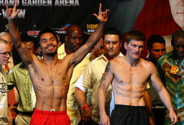 LAS VEGAS - MAY 01:  (L-R) Manny Pacquiao of the Philippines and Ricky Hatton of England pose after both fighters stepped on the scale during the weigh-in for their junior welterweight title fight at the MGM Grand Garden Arena May 1, 2009 in Las Vegas, Nevada.Photo by Al Bello/Getty Images)  (Photo by Al Bello/Getty Images)