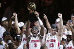 AUBURN HILLS, MI - JUNE 15:  Ben Wallace #3 (C) of the Detroit Pistons holds up the Larry O'Brien NBA Championship trophy as he celebrates with teammatesafter defeating the Los Angeles Lakers 100-87 in game five of the 2004 NBA Finals on June 15, 2004 at The Palace of Auburn Hills in Auburn Hills, Michigan.  NOTE TO USER: User expressly acknowledges and agrees that, by downloading and or using this photograph, User is consenting to the terms and conditions of the Getty Images License Agreement. (Photo by Tom Pidgeon/Getty Images)