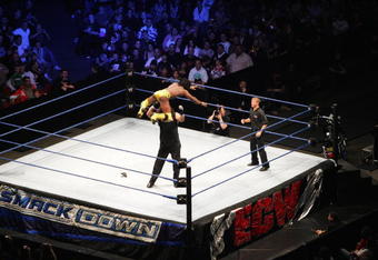 SYDNEY, AUSTRALIA - JUNE 15:  Kofi Kingston leaps from the turnbuckle against Chuck Palumbo during WWE Smackdown at Acer Arena on June 15, 2008 in Sydney, Australia.  (Photo by Gaye Gerard/Getty Images)
