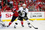 WASHINGTON - MAY 02:  Shaone Morrisonn #26 of the Washington Capitals battles in the crease with Sidney Crosby #87 of the Pittsburgh Penguins during Game One of the Eastern Conference Semifinal Round of the 2009 Stanley Cup Playoffs on May 2, 2009 at the Verizon Center in Washington,  DC.  (Photo by Len Redkoles/Getty Images)