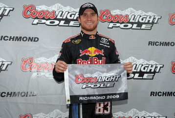 RICHMOND, VA - MAY 01:  Brian Vickers, driver of the #83 Red Bull Toyota, poses after winning the pole award during qualifying for the NASCAR Sprint Cup Series Crown Royal Presents the Russ Friedman 400 at Richmond International Raceway on May 1, 2009 in Richmond, Virginia.  (Photo by Drew Hallowell/Getty Images)