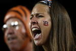 CINCINNATI - OCTOBER 01:  A Cincinnati Bengals fan gives support to her team during the NFL game against the New England Patriots on October 1, 2007 at Paul Brown Stadium in Cincinnati, Ohio.  (Photo by Andy Lyons/Getty Images)