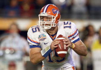 MIAMI - JANUARY 08:  Quarterback Tim Tebow #15 of the Florida Gators moves to pass the ball during the FedEx BCS National Championship Game against the Oklahoma Sooners at Dolphin Stadium on January 8, 2009 in Miami, Florida.  (Photo by Donald Miralle/Getty Images)
