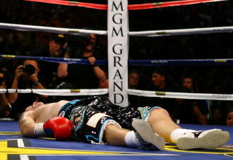 LAS VEGAS - MAY 02:  Ricky Hatton of England lays on the mat after Manny Pacquiao of the Philippines knocked him out in the second round during their junior welterweight title fight at the MGM Grand Garden Arena May 2, 2009 in Las Vegas, Nevada.  (Photo by Al Bello/Getty Images)