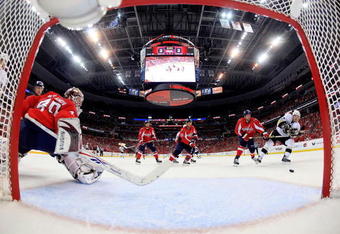 WASHINGTON - MAY 02:  Simeon Varlamov #40 of the Washington Capitals stops a shot on goal by Sidney Crosby #87 of the Pittsburgh Penguins during Game One of the Eastern Conference Semifinal Round of the 2009 Stanley Cup Playoffs on May 2, 2009 at the Verizon Center in Washington,  DC.  (Photo by Len Redkoles/Getty Images)