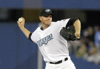 TORONTO - APRIL 6: Roy Halladay #32 of the Toronto Blue Jays delivers the pitch during the Opening Day game against the Detroit Tigers at the Rogers Centre on April 6, 2009 in Toronto, Ontario. (Photo by: Dave Sandford/Getty Images)