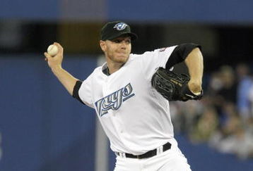 TORONTO - APRIL 6: Roy Halladay #32 of the Toronto Blue Jays delivers the pitch during the Opening Day game against the Detroit Tigers at the Rogers Centre on April 6, 2009 in Toronto, Ontario. (Photo by: Dave Sandford/Getty Images)