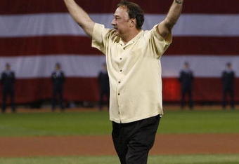 BOSTON - OCTOBER 03:  Former Red Sox second baseman Jerry Remy throws out the first pitch before the Boston Red Sox and Los Angeles Angels meet for Game one of the American League Division Series on October 3, 2007 at Fenway Park in Boston, Massachusetts. (Photo by Jim Rogash/Getty Images)  