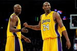 LOS ANGELES, CA - APRIL 27:  (R-L) Kobe Bryant #24 of the Los Angeles Lakers gives teammate Lamar Odom #7 a five in the third quarter against the Utah Jazz in Game Five of the Western Conference Quarterfinals during the 2009 NBA Playoffs at Staples Center on April 27, 2009 in Los Angeles, California. NOTE TO USER: User expressly acknowledges and agrees that, by downloading and or using this photograph, User is consenting to the terms and conditions of the Getty Images License Agreement.  (Photo by Kevork Djansezian/Getty Images)