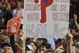 PHILADELPHIA - APRIL 17: A Philadelphia Phillies fan holds up a sign in honor of recently departed Philadelphia Phillies announcer Harry Kalas during the game the San Diego Padres and Philadelphia Phillies on April 17, 2009 in Philadelphia, Pennsylvania. Kalas died of a heart attack on April 13, 2009 in Washington, D.C. after falling unconscious in the press box before the Washington Nationals home opener against the Phillies. (Photo by Drew Hallowell/Getty Images)