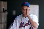 NEW YORK - APRIL 26:  Oliver Perez #46 of the New York Mets reacts in the dugout after he was taken out of their game against the Washington Nationals in the fifth inning on April 26, 2009 at Citi Field in the Flushing neighborhood of the Queens borough of New York City.  (Photo by Ezra Shaw/Getty Images)
