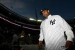 NEW YORK - DECEMBER 18:  CC Sabathia walks off the field after a press conference to announce his signing to the New York Yankees at Yankee Stadium on December 18, 2008  in the Bronx borough of New York City.  (Photo by Nick Laham/Getty Images)
