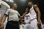 MILWAUKEE - FEBRUARY 20:  Referee Luis Grillo #8 warns Charlie Villanueva #31 of the Milwaukee Bucks to stay off of the court after a melee broke out during a game between the Bucks and the Cleveland Cavaliers on February 20, 2009 at the Bradley Center in Milwaukee, Wisconsin. The Cavaliers defeated the Bucks 111-103. NOTE TO USER: User expressly acknowledges and agreees that, by downloading and/or using this Photograph, User is consenting to the terms and conditions of the Getty Images License Agreement. (Photo by Jonathan Daniel/Getty Images)