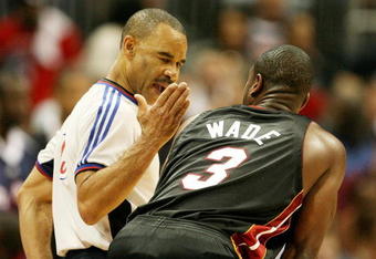 ATLANTA - APRIL 22:  Dwyane Wade #3 of the Miami Heat talks with official Dan Crawford after being called for a foul while taking on the Atlanta Hawks during Game Two of the Eastern Conference Quarterfinals at Philips Arena on April 22, 2009 in Atlanta, Georgia. The Heat defeated the Hawks 108-93. NOTE TO USER: User expressly acknowledges and agrees that, by downloading and/or using this Photograph, user is consenting to the terms and conditions of the Getty Images License Agreement.  (Photo by Doug Benc/Getty Images)