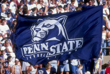 5 Sep 1998:  Penn State Nittany Lion fans hoist a flag up in the air during a game against the Southern Mississippi State Golden Eagles at the Beaver Stadium in State College, Pennsylvania. The Nittany Lions defeated the Golden Eagles 34-6. Mandatory Cred