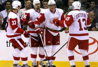 LOS ANGELES, CA - OCTOBER 27:  Marian Hossa #81 of the Detroit Red Wings celebrates with teammates Mikael Samuelsson #37, Tomas Holmstrom #96 and Pavel Datsyuk #13 after Hossa scored a second period power play goal against the Los Angeles Kings during the NHL game at Staples Center on October 27, 2008 in Los Angeles, California.  (Photo by Christian Petersen/Getty Images)