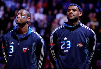 PHOENIX - FEBRUARY 15:  Dwyane Wade #3 and LeBron James #23 of the Eastern Conference stand during the National Anthem before the 58th NBA All-Star Game, part of 2009 NBA All-Star Weekend at US Airways Center on February 15, 2009 in Phoenix, Arizona.  NOTE TO USER: User expressly acknowledges and agrees that, by downloading and or using this photograph, User is consenting to the terms and conditions of the Getty Images License Agreement.  (Photo by Kevork Djansezian/Getty Images)