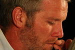 GREEN BAY, WI - MARCH 06: Quarterback Brett Favre of the Green Bay Packers tries to control his emotions at his retirement press conference on March 6, 2008 at Lambeau Field in Green Bay, Wisconsin. (Photo by Jonathan Daniel/Getty Images)