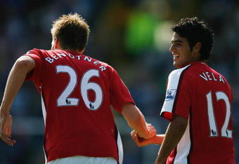 PORTSMOUTH, UNITED KINGDOM - MAY 02:  Carlos Vela of Arsenal celebrates with Nicklas Bendtner as he scores their thrid goal during the Barclays Premier League match between Portsmouth and Arsenal at Fratton Park on May 2, 2009 in Portsmouth, England.  (Photo by Paul Gilham/Getty Images)
