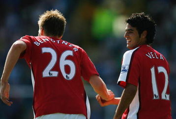 PORTSMOUTH, UNITED KINGDOM - MAY 02:  Carlos Vela of Arsenal celebrates with Nicklas Bendtner as he scores their thrid goal during the Barclays Premier League match between Portsmouth and Arsenal at Fratton Park on May 2, 2009 in Portsmouth, England.  (Photo by Paul Gilham/Getty Images)
