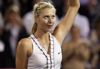 MONTREAL - JULY 30:  Maria Sharapova of Russia acknowledges the crowd after defeating Marta Domachowska of Poland during Day 3 of Rogers Cup Tennis on July 30,2008 at Stade Uniprix in Montreal, Quebec, Canada. Sharapova defeated Domachowska 7-5, 5-7, 6-2.  (Photo by Elsa/Getty Images)