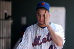 NEW YORK - APRIL 26:  Oliver Perez #46 of the New York Mets reacts in the dugout after he was taken out of their game against the Washington Nationals in the fifth inning on April 26, 2009 at Citi Field in the Flushing neighborhood of the Queens borough of New York City.  (Photo by Ezra Shaw/Getty Images)
