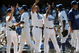 LOS ANGELES, CA - MAY 03:  Manny Ramirez #99 of the Los Angeles Dodgers celebrates a 7-3 victory over the San Diego Padres with teammates at Dodger Stadium on May 3, 2009 in Los Angeles, California.  (Photo by Harry How/Getty Images)