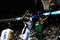ORLANDO, FL - MARCH 25:  Rajon Rondo #9 of the Boston Celtics attempts a shot over Dwight Howard #12 of the Orlando Magic on March 25, 2009 at Amway Arena in Orlando, Florida.  NOTE TO USER: User expressly acknowledges and agrees that, by downloading and/or using this Photograph, user is consenting to the terms and conditions of the Getty Images License Agreement.  (Photo by Sam Greenwood/Getty Images)