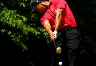 CHARLOTTE, NC - MAY 03:  Tiger Woods of the USA tee's off at the 5th during the final round of the Quail Hollow Championship at Quail Hollow Golf Club on May 3, 2009 in Charlotte, North Carolina.  (Photo by Richard Heathcote/Getty Images)
