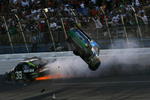 TALLADEGA, AL - APRIL 26:  Carl Edwards, driver of the #99 Claritin Ford goes airborne as Ryan Newman, driver of the #34 Stewart-Haas Racing Chevrolet hits the wall at the end of the NASCAR Sprint Cup Series Aaron's 499 at Talladega Superspeedway on April 26, 2009 in Talladega, Alabama.  (Photo by Todd Warshaw/Getty Images)