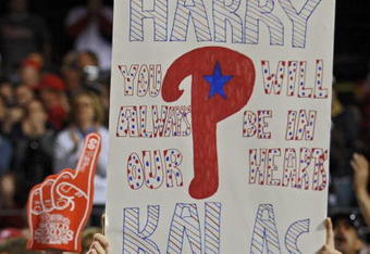 PHILADELPHIA - APRIL 17: A Philadelphia Phillies fan holds up a sign in honor of recently departed Philadelphia Phillies announcer Harry Kalas during the game the San Diego Padres and Philadelphia Phillies on April 17, 2009 in Philadelphia, Pennsylvania. Kalas died of a heart attack on April 13, 2009 in Washington, D.C. after falling unconscious in the press box before the Washington Nationals home opener against the Phillies. (Photo by Drew Hallowell/Getty Images)
