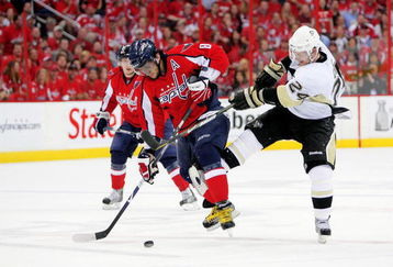 WASHINGTON - MAY 02:  Alex Ovechkin #8 of the Washington Capitals battles Matt Cooke #24 of the Pittsburgh Penguins during Game One of the Eastern Conference Semifinal Round of the 2009 Stanley Cup Playoffs on May 2, 2009 at the Verizon Center in Washington,  DC.  (Photo by Len Redkoles/Getty Images)