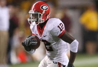 TEMPE, AZ - SEPTEMBER 20:  Wide receiver Tavarres King #12 of the Georgia Bulldogs carries the ball against the Arizona State Sun Devils on September 20, 2008 at Sun Devil Stadium in Tempe, Arizona.  Georgia won 27-10.  (Photo by Stephen Dunn/Getty Images)