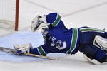 VANCOUVER, CANADA - MAY 2: Roberto Luongo #1 of the Vancouver Canucks makes a diving save from a shot by the of the Chicago Blackhawks during Game Two of the Western Conference Semifinals of the 2009 Stanley Cup Playoffs on May 02, 2009 at General Motors Place in Vancouver, British Columbia, Canada.  (Photo by Nick Didlick/Getty Images)