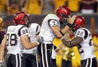 TEMPE, AZ - SEPTEMBER 15: Quarterback Kevin O'Connell #7 of the San Diego State Aztecs celebrates with  Lynell Hamilton#22 during the game against the Arizona State Sun Devils on September 15, 2007 at Sun Devil Stadium in Tempe, Arizona.  (Photo by Stephen Dunn/Getty Images)