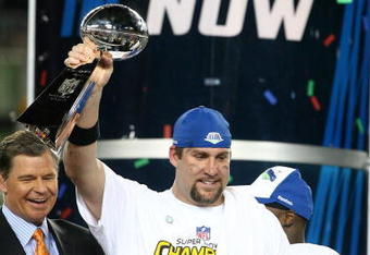 TAMPA, FL - FEBRUARY 01:  Quarterback Ben Roethlisberger #7 of the Pittsburgh Steelers celebrates with the Vince Lombardi trophy after the Steelers won 27-23 against the Arizona Cardinals during Super Bowl XLIII on February 1, 2009 at Raymond James Stadium in Tampa, Florida. (Photo by Al Bello/Getty Images)